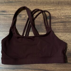 Athleta Train Free Strappy Sports Bra   Size large. Color is Garnet